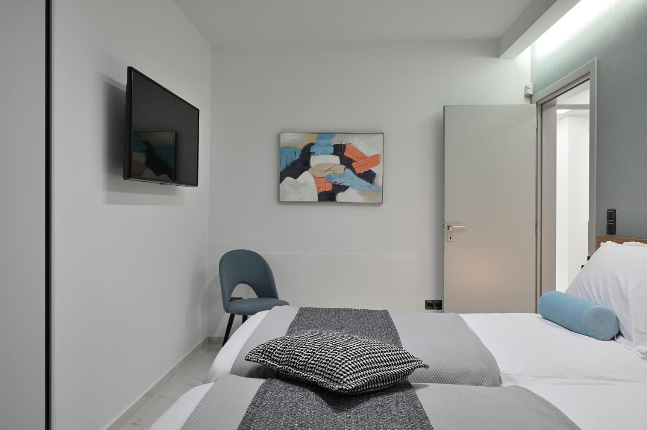 The Lop Athens Holidays Luxury Suites Exterior photo
